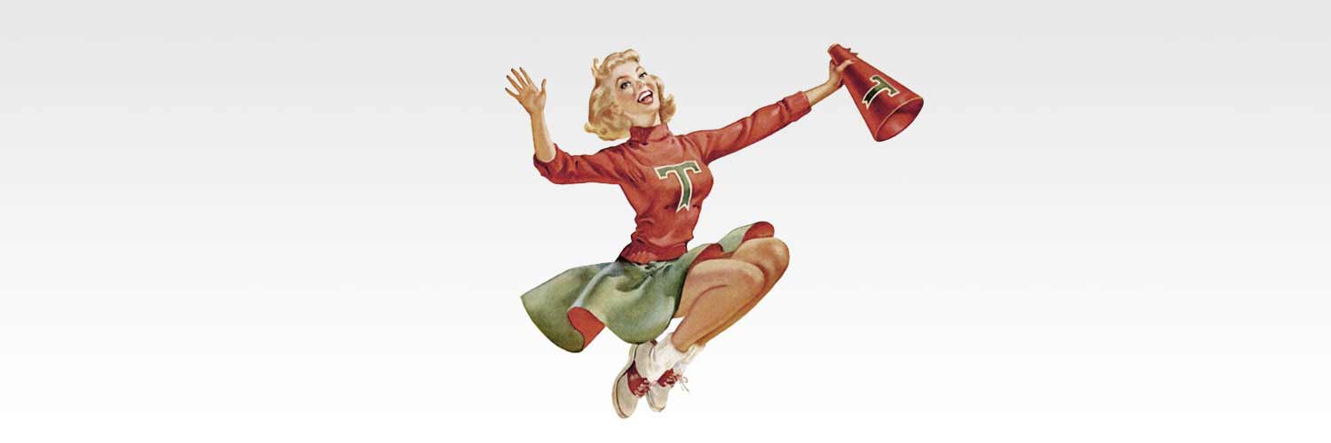 Cheerleader jumping with megaphone and pom-poms.