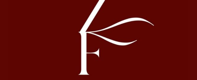 White KF monogram on maroon background